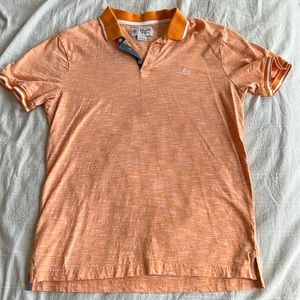 Penguin polo barely worn, perfect condition. Orange cream color, 100% cotton.